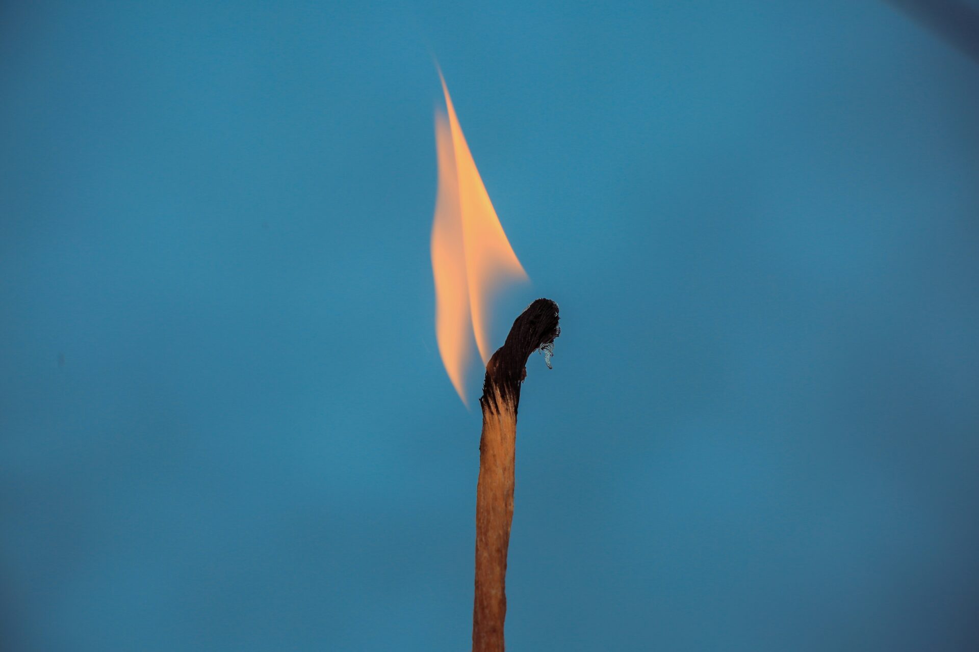 A burning matchstick.