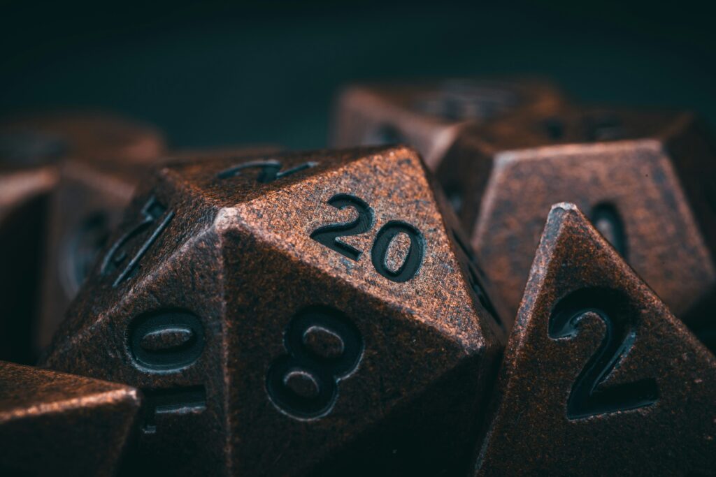Dungeons and Dragons dice on a table.